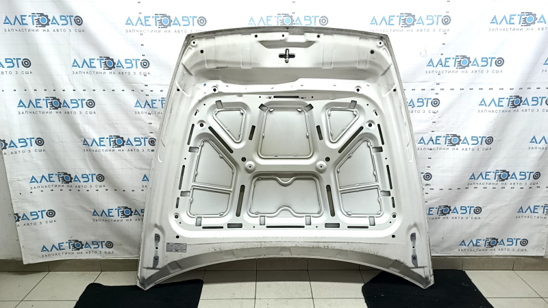 The bare hood of a Hyundai Sonata 20-23 US steel, graphite T2G, dented, bumped