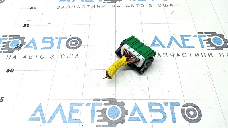 The green chip for the SRS airbag computer module of the Hyundai Santa FE 21-23