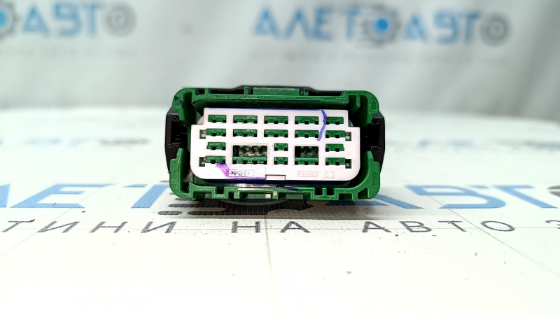 The green chip for the SRS airbag computer module of the Hyundai Santa FE 21-23
