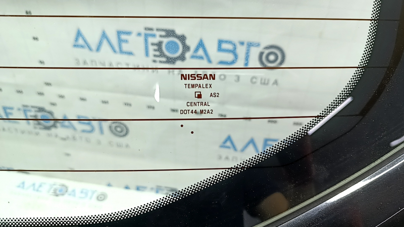 The trunk door is bare with glass, Nissan Rogue Sport 17-22 black G41, scratches on the glass.