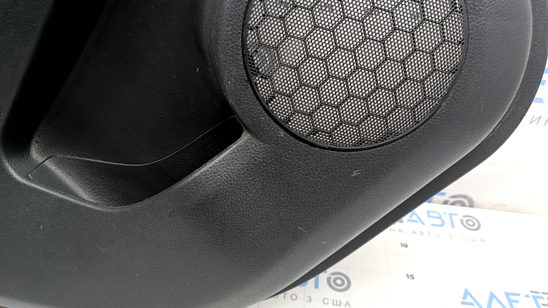 Rear left door panel for a 2022 Nissan Rogue Sport, black with black insert, black leather armrest, scratches