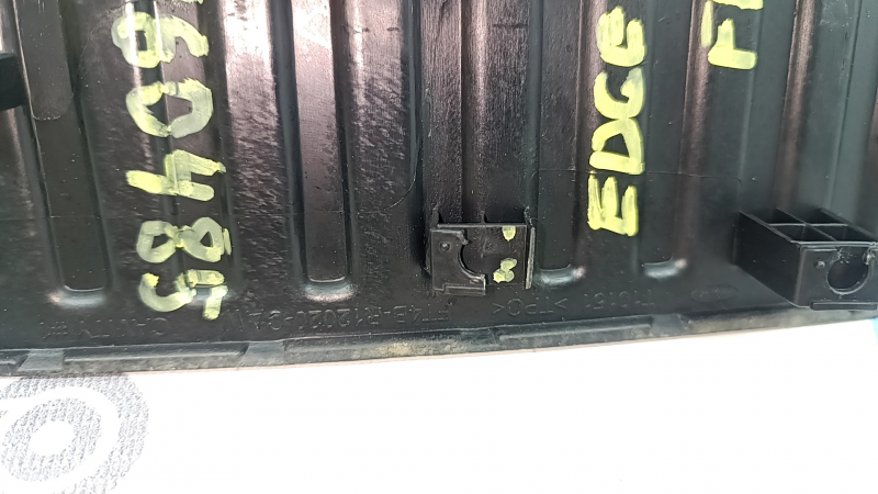 The driver's footrest for the Ford Edge 15-24 is black, the fasteners are broken, and it is worn.