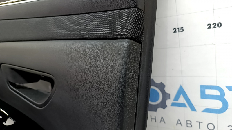 Door trim, rear left, Hyundai Tucson 22-26, black leather with black fabric insert, black leather armrest, chrome molding with black gloss, scratches, dry-cleanable, sooty