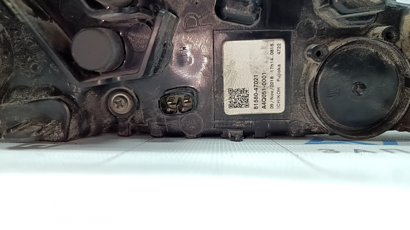The right lower bumper light of a Toyota Prius 50 16-18 has dirty glass from the inside.