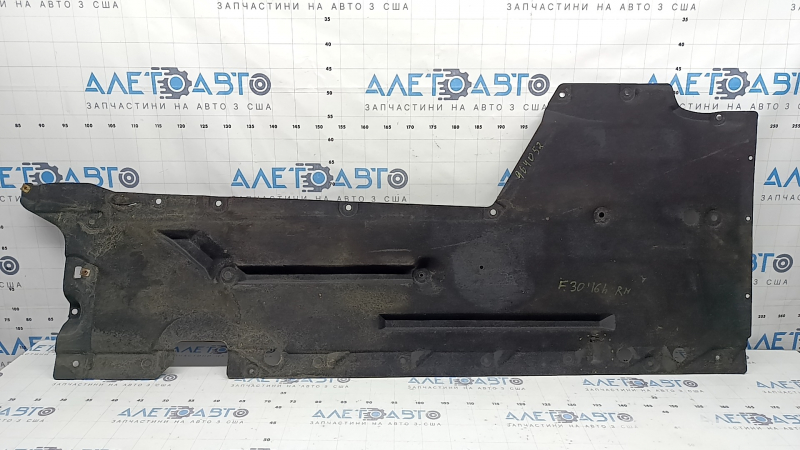 Right underbody protection for BMW 3 F30 4d 12-18 is worn and has tears.