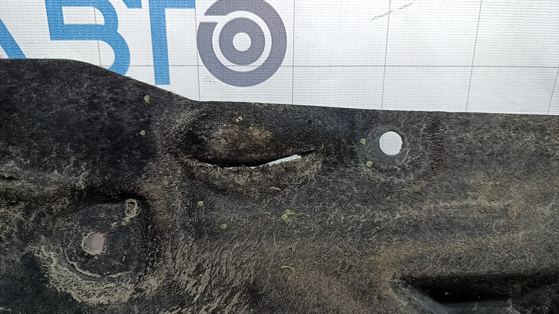 Right underbody protection for BMW 3 F30 4d 12-18 is worn and has tears.