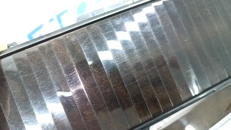 A set of interior trims for the Volvo XC90 16-25 in Classic wood / Flame birch, Bowers & Wilkins, with illumination, scratches