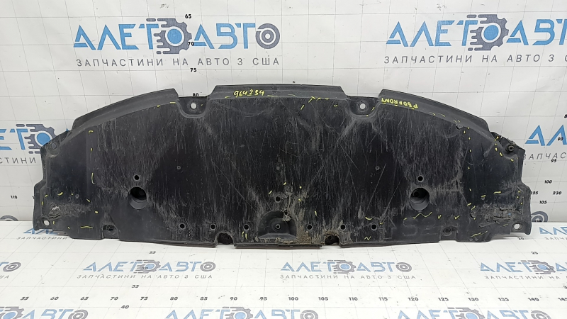The front bumper guard of a Toyota Prius 50 16-18 is worn, torn, and dented.