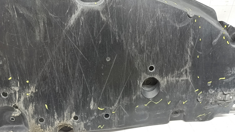 The front bumper guard of a Toyota Prius 50 16-18 is worn, torn, and dented.