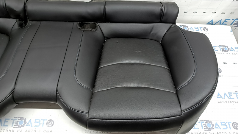 Chevrolet Volt 16-18 rear seat cushion, black leather with blue stitching, perforated, dents