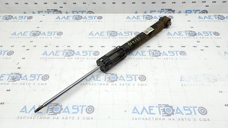 The rear left shock absorber for a VW Tiguan 18-24 AWD is rusty.