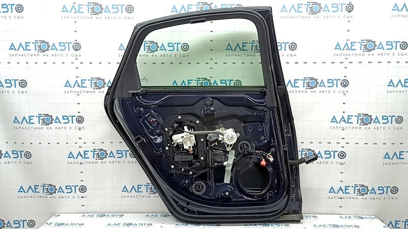 Complete rear left door for an Audi A6 C8 19-21 keyless, triplex, door closer, under the curtain, blue LX5B, dent, bump