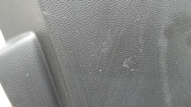 The lower right center pillar trim for an Audi A6 C8 19-25 is black, scratched, the plastic has turned white, and the mount is broken.