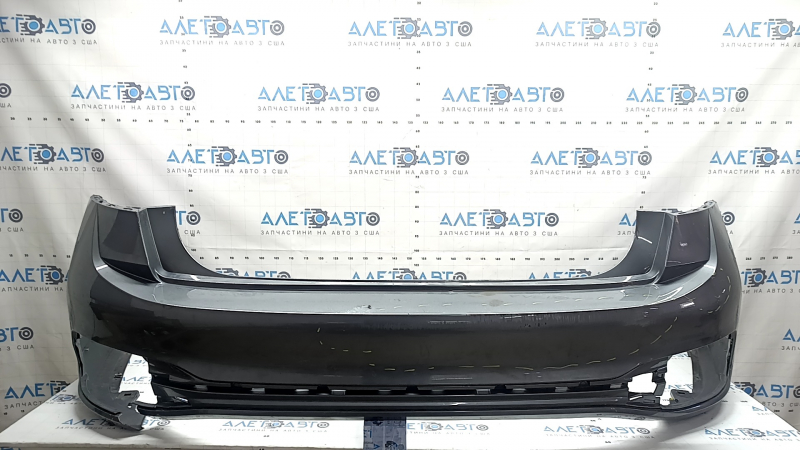 Bare rear bumper VW Jetta 22-26 graphite, scratches, cracked fasteners, broken fasteners, cracked