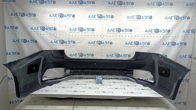 Bare rear bumper VW Jetta 22-26 graphite, scratches, cracked fasteners, broken fasteners, cracked