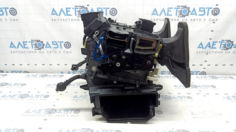 The bare heater housing of the Porsche Macan 15-26 air conditioner.