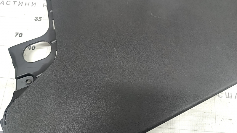 Mazda 3 19-21 4D black center console trim, lower left side, Japan built, scratches