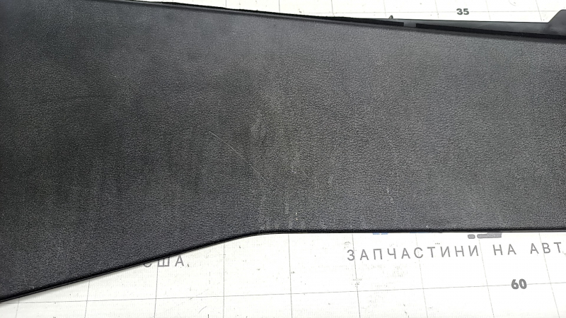 Mazda 3 19-26 4D black center console trim, lower right side, Japan built, scratches