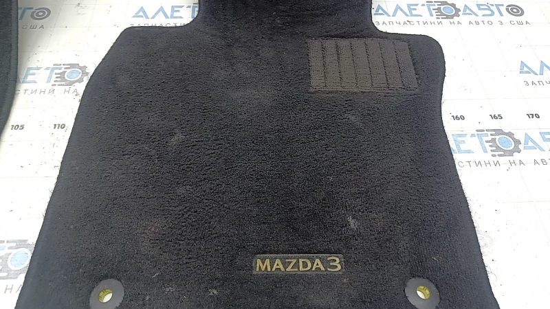 Set of black fabric floor mats for Mazda 3 19-23, ready for cleaning