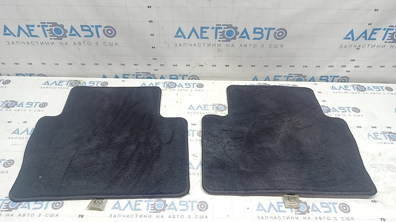 Set of black fabric floor mats for Mazda 3 19-23, ready for cleaning