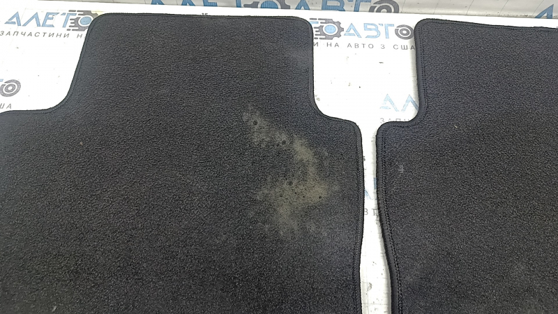 Set of black fabric floor mats for Mazda 3 19-23, ready for cleaning