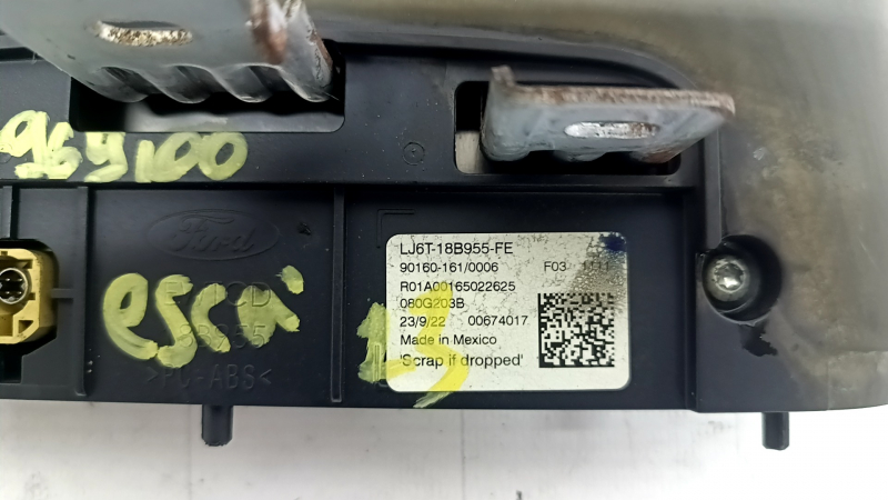 The Ford Escape MK4 2020 8" monitor, display, and navigation system is covered in soot, chips, and scratches.