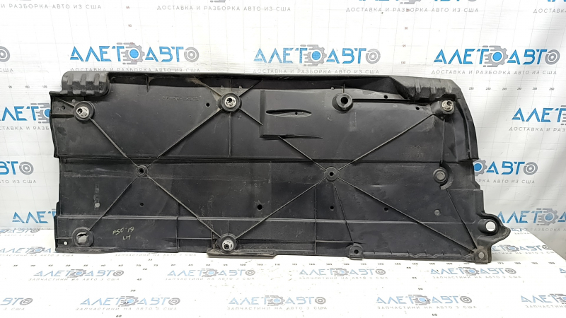 Left underbody protection for Toyota Prius 50 19-22 is dented and torn.
