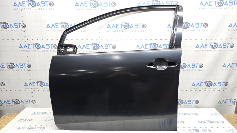 The front left door of a Toyota Prius 50 19-22 is bare and has a bent corner.
