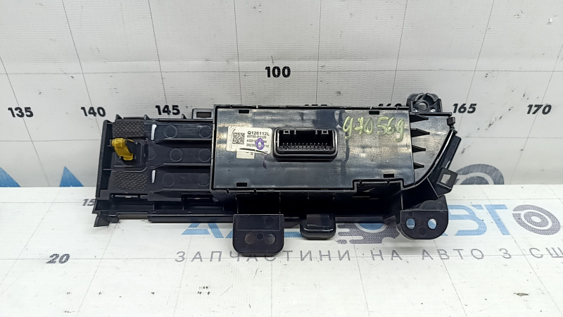 Left front panel button block for Kia Sportage 23-25 under electric trunk door, paint is melted, scratches