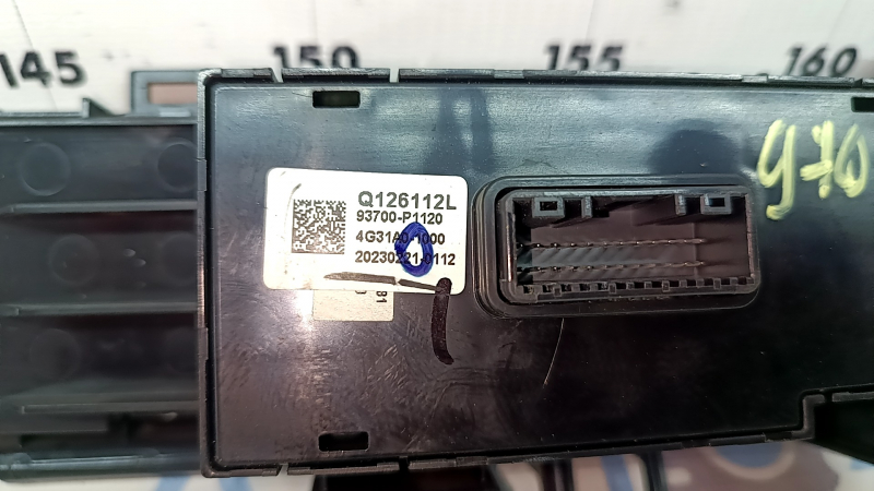 Left front panel button block for Kia Sportage 23-25 under electric trunk door, paint is melted, scratches