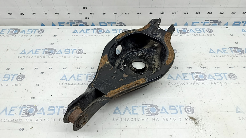The lower control arm under the spring, rear right Mitsubishi Outlander 22-26 2.5, rusty