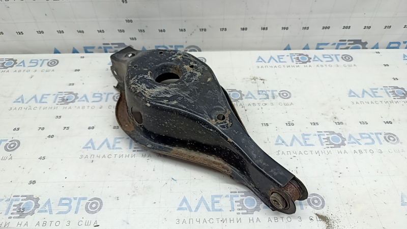The lower control arm under the spring, rear right Mitsubishi Outlander 22-26 2.5, rusty