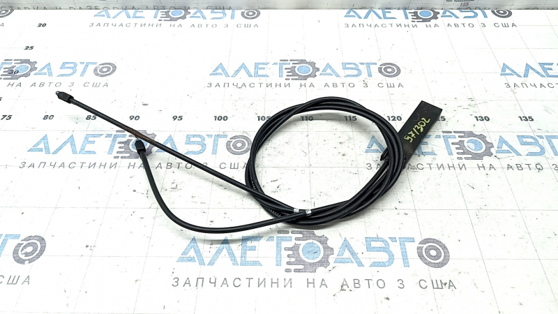 The insulation on the front hood release cable of a Volvo XC90 16-26 has dried out.
