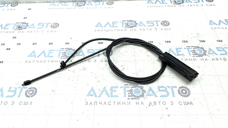 The insulation on the front hood release cable of a Volvo XC90 16-26 has dried out.