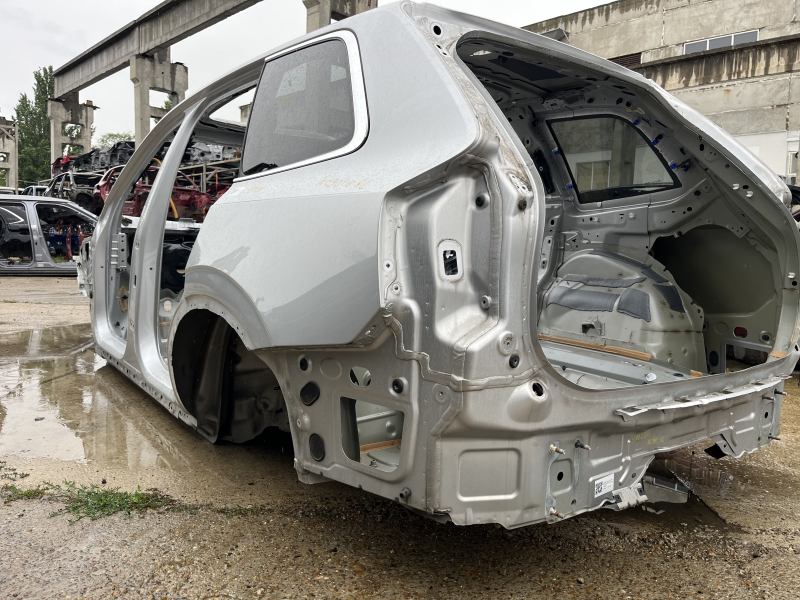 Quarter wing rear left Volvo XC90 16-26 on the body, silver, dented threshold, bumps at sunset