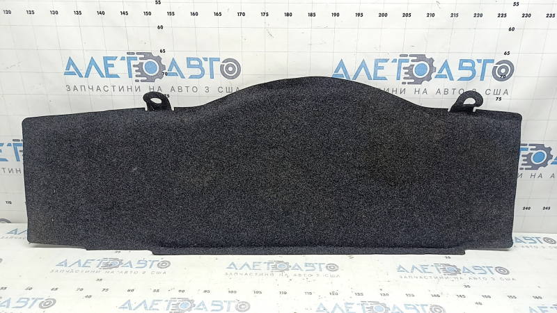 The trunk floor of a Ford Fusion mk5 13-20 plug-in has come unstuck.