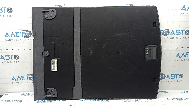 The trunk floor of the Audi A5 F5 19-25 5D is black and dented.