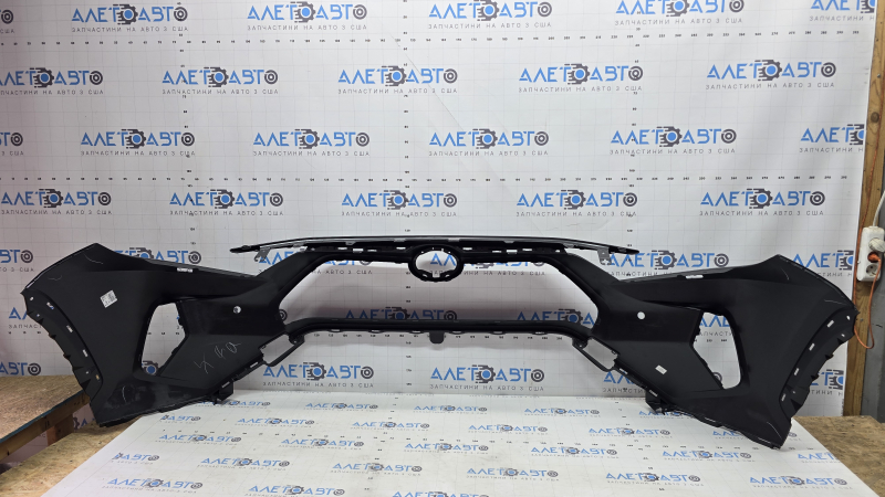 Bare front bumper for Toyota Rav4 19-25, with parking sensors and plugs, Japan-built, scratches