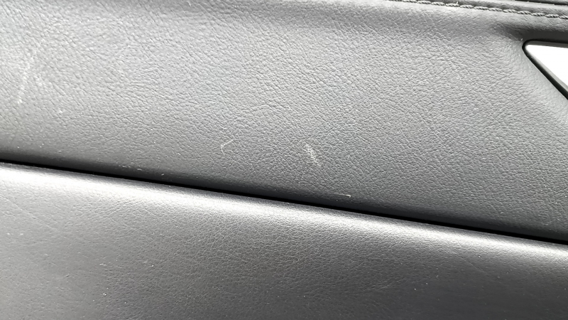 Mazda CX-5 17-23 black front left door panel with black leather insert, black leather armrest, gray molding, with handle, scuffs