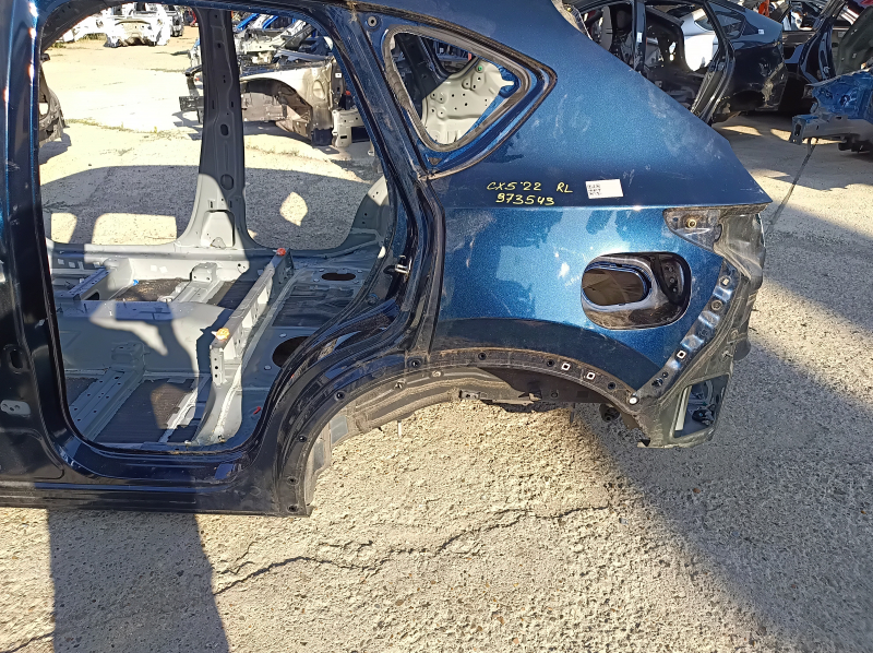 Mazda CX-5 17-25 rear left quarter wing on the body, blue