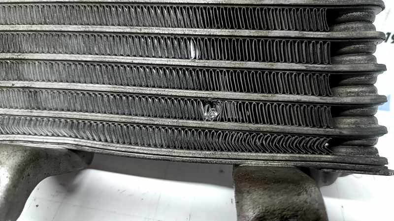 Toyota Highlander 20-26 hybrid automatic transmission cooling radiator is bent.
