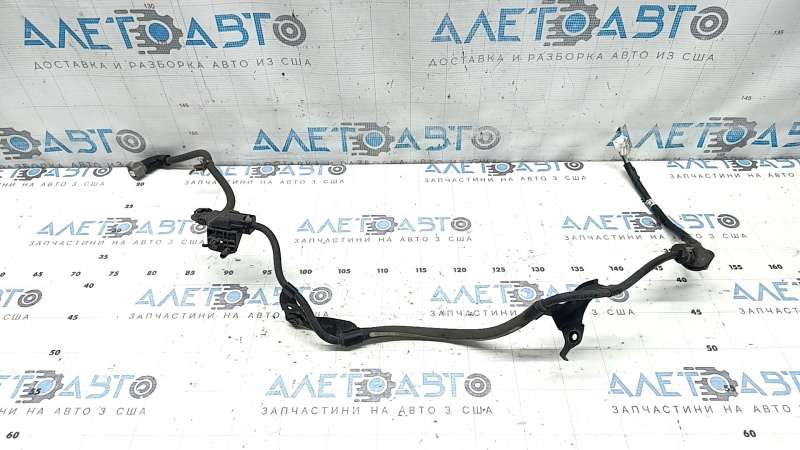 The rear left ABS sensor wire on a Lexus UX 19-26 has a broken connector.