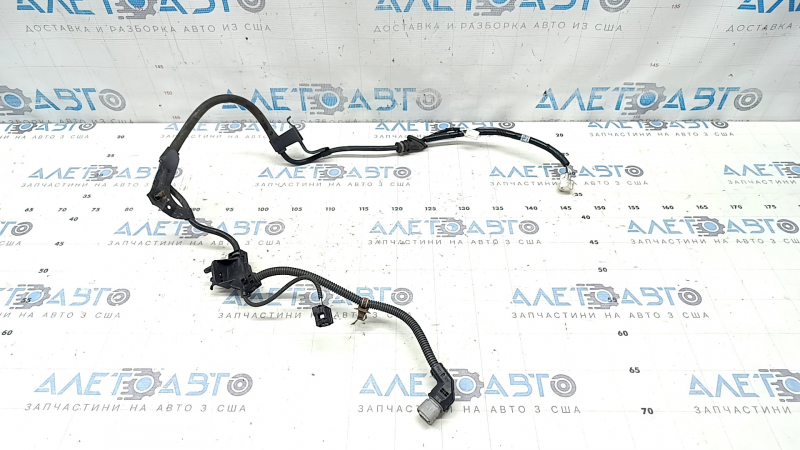 The rear left ABS sensor wire on a Lexus UX 19-26 has a broken connector.