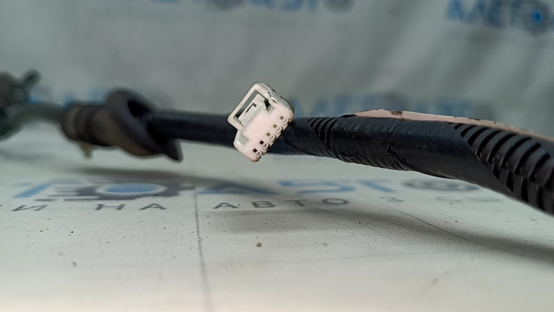 The rear left ABS sensor wire on a Lexus UX 19-26 has a broken connector.