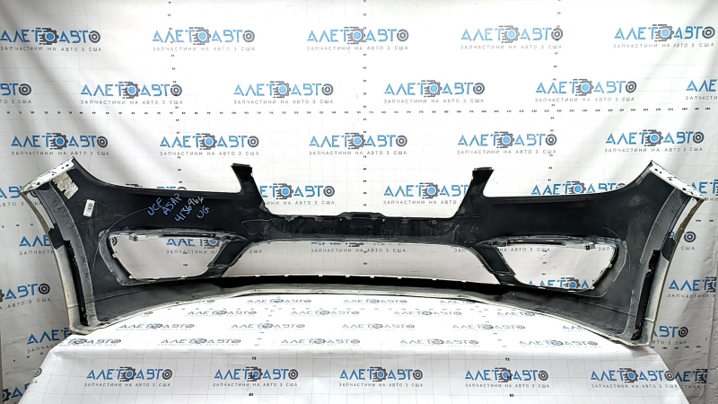 Bare front bumper for a Lincoln MKZ 17-20, without parking sensors and without a tow hook, white, painted, scratches, broken fasteners