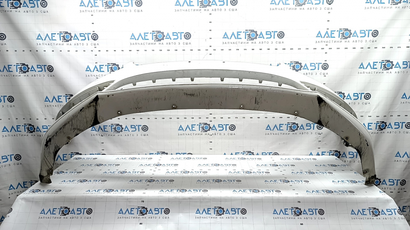 Bare front bumper for a Lincoln MKZ 17-20, without parking sensors and without a tow hook, white, painted, scratches, broken fasteners