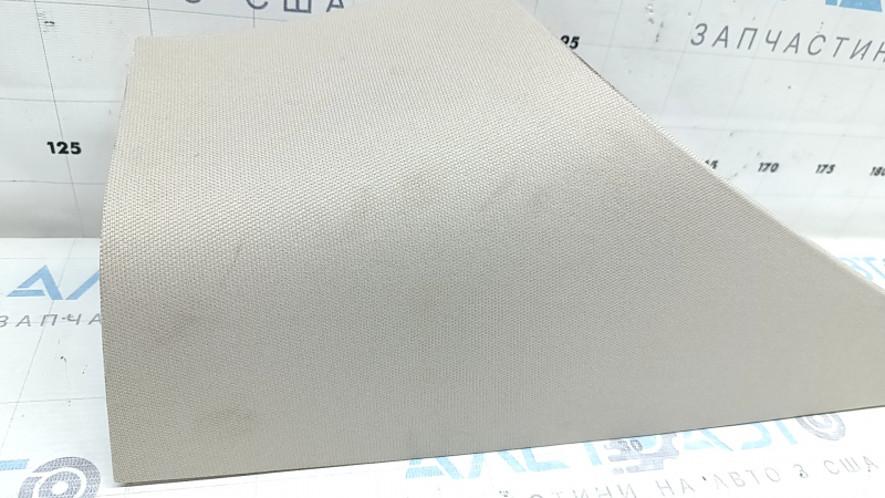 Upper left rear pillar trim for a Lincoln MKZ 17-20, beige, behind the window, needs dry cleaning, broken mount
