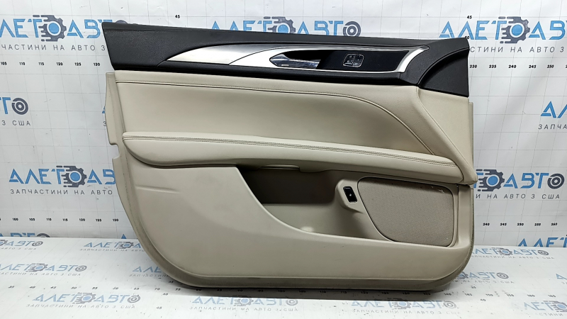 Beige front left door panel for a Lincoln MKZ 17-20, with beige leather insert, beige leather armrest, gray molding, brown upper part, with handle, dry-cleanable, scratches