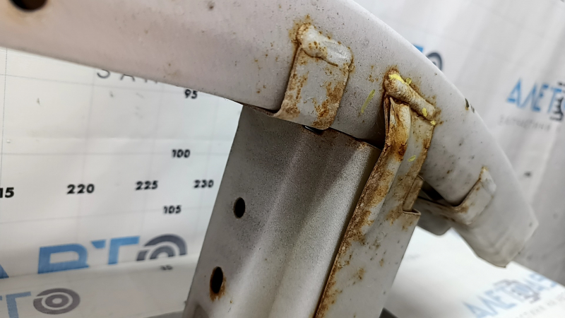 Lincoln MKZ 13-20 rear bumper reinforcement is pinned and rusty.