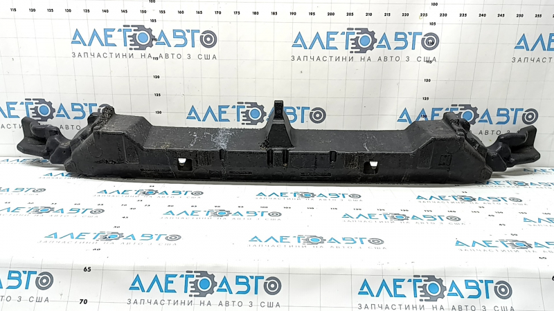The upper front bumper absorber of a Toyota Rav4 19-24 is broken and missing fragments.